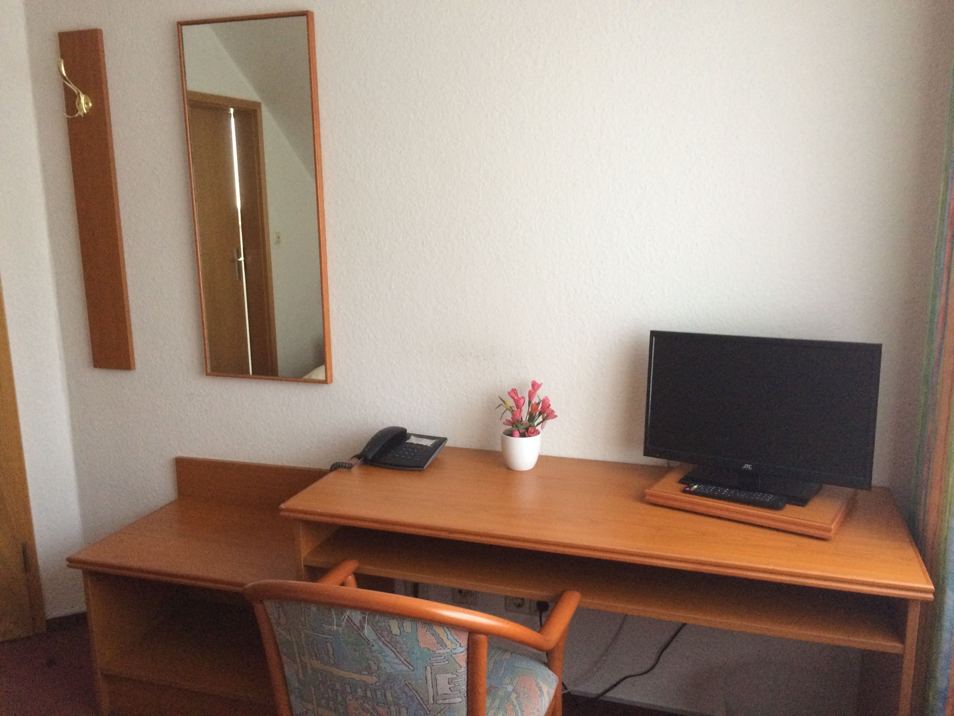 single room | living area | flat-screen tv