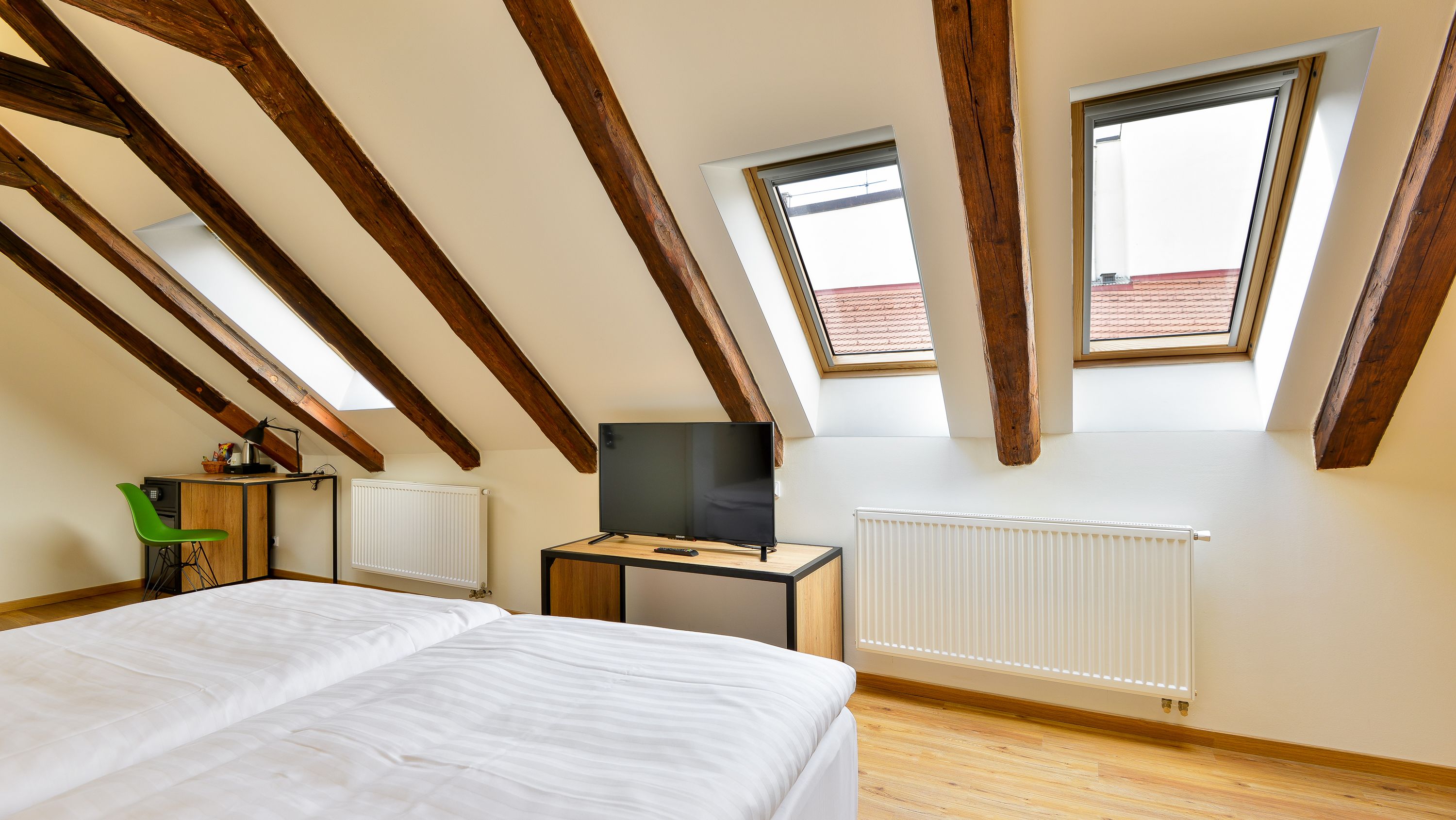 rooftop superior double room | minibar, in-room safe, desk, laptop workspace