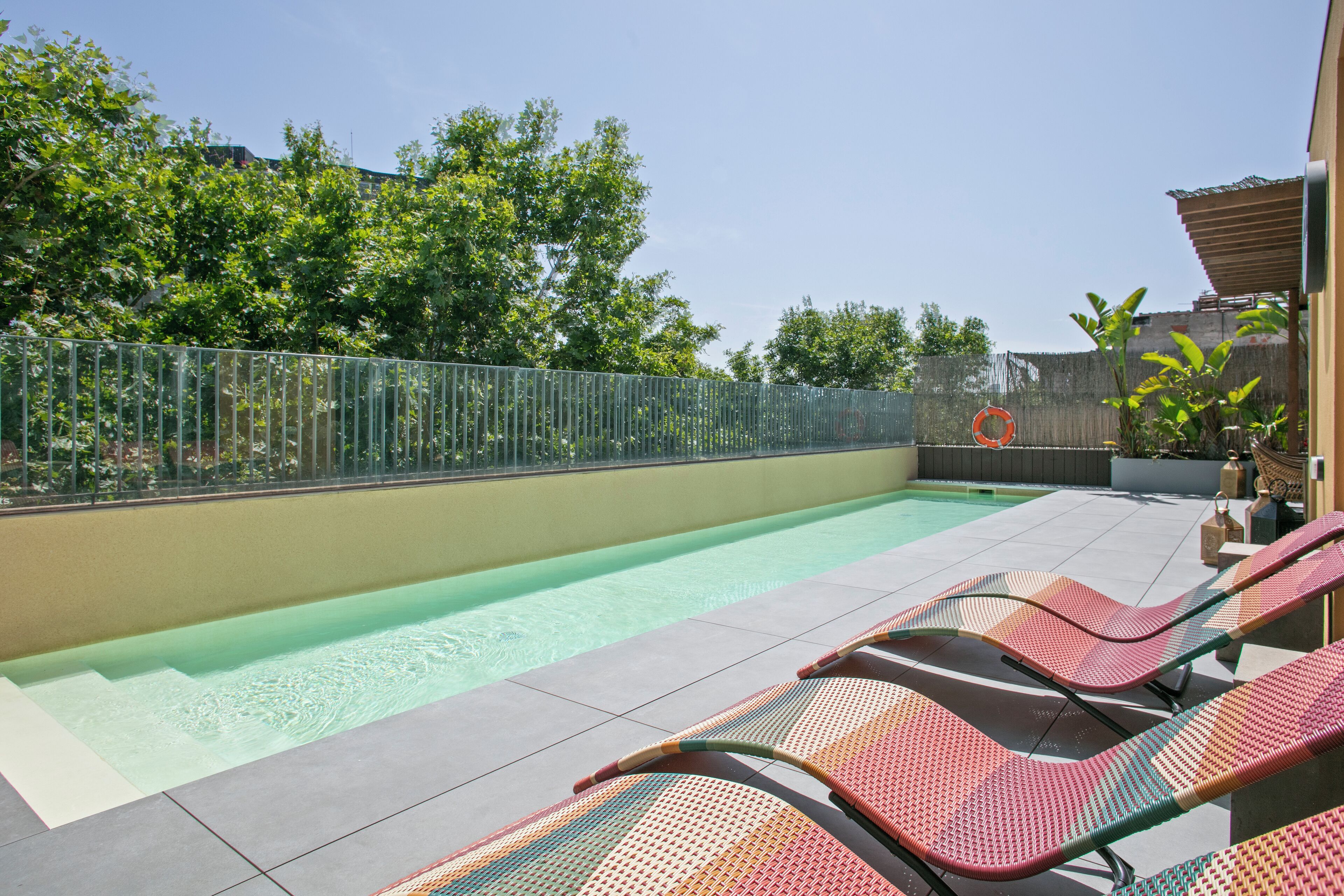 seasonal outdoor pool, pool umbrellas, pool loungers
