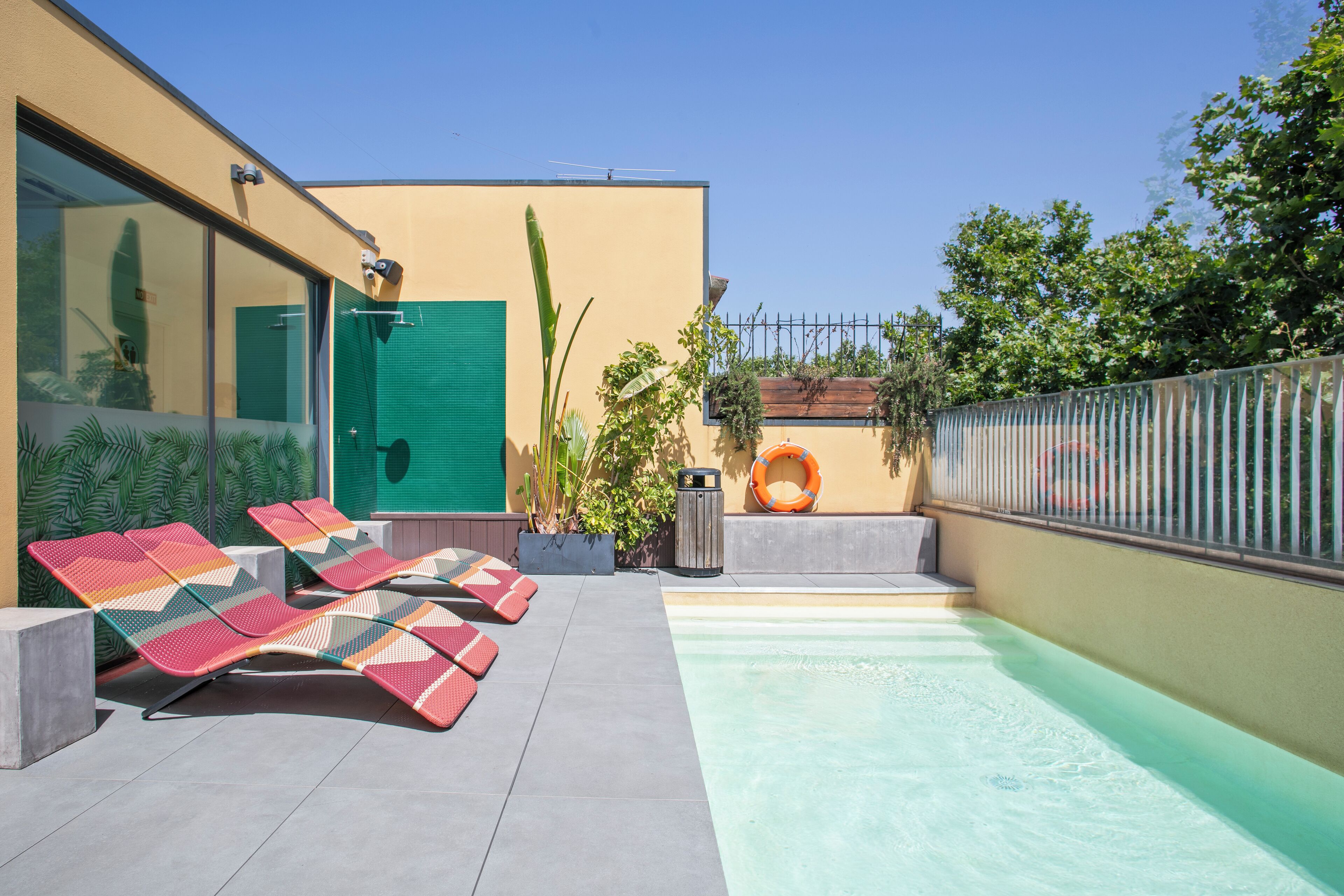 seasonal outdoor pool, pool umbrellas, pool loungers