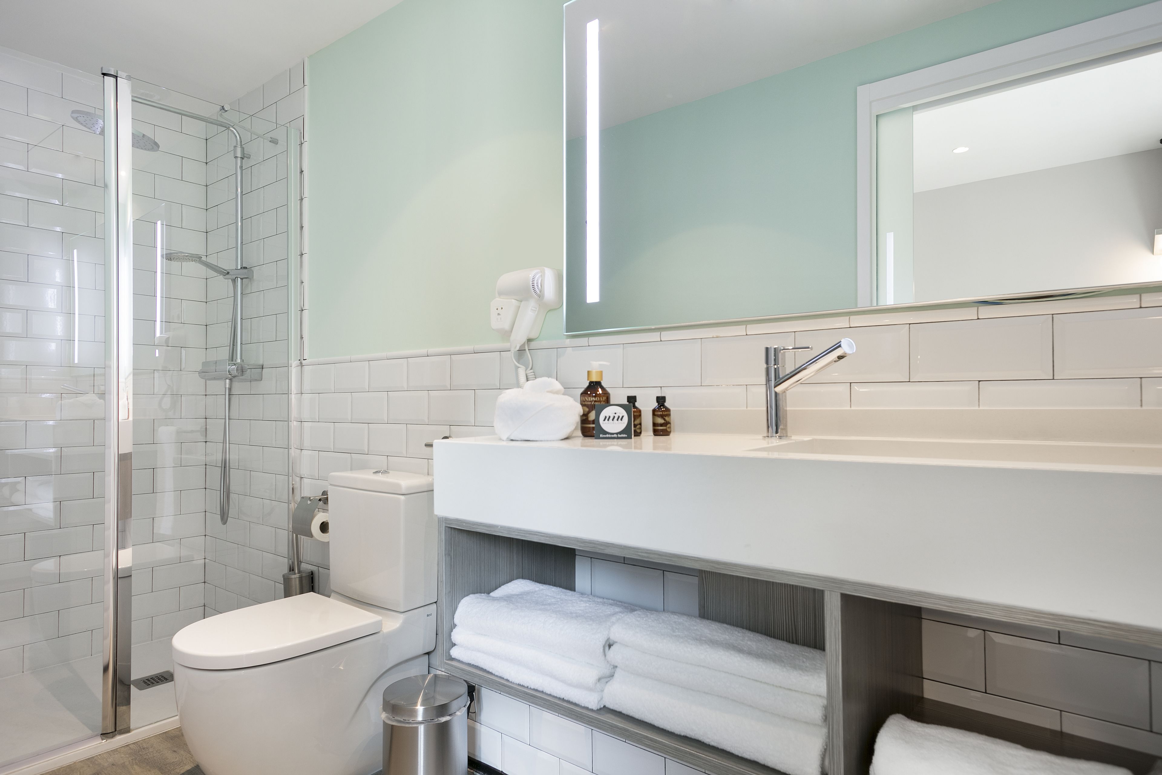 shower, free toiletries, hair dryer, towels