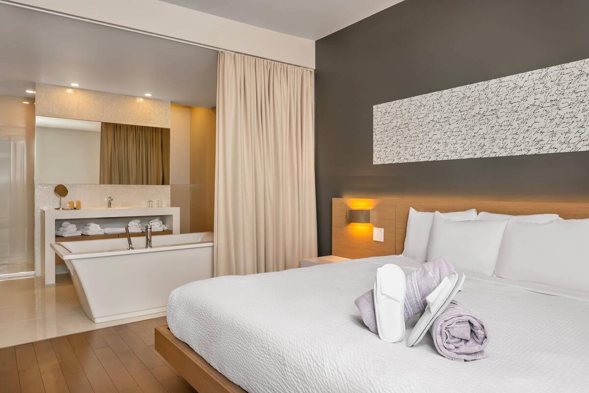Suite, 1 King Bed, Non Smoking, Lake View | 1 bedroom, minibar, laptop workspace, soundproofing
