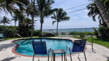 Outdoor pool, pool umbrellas, pool loungers