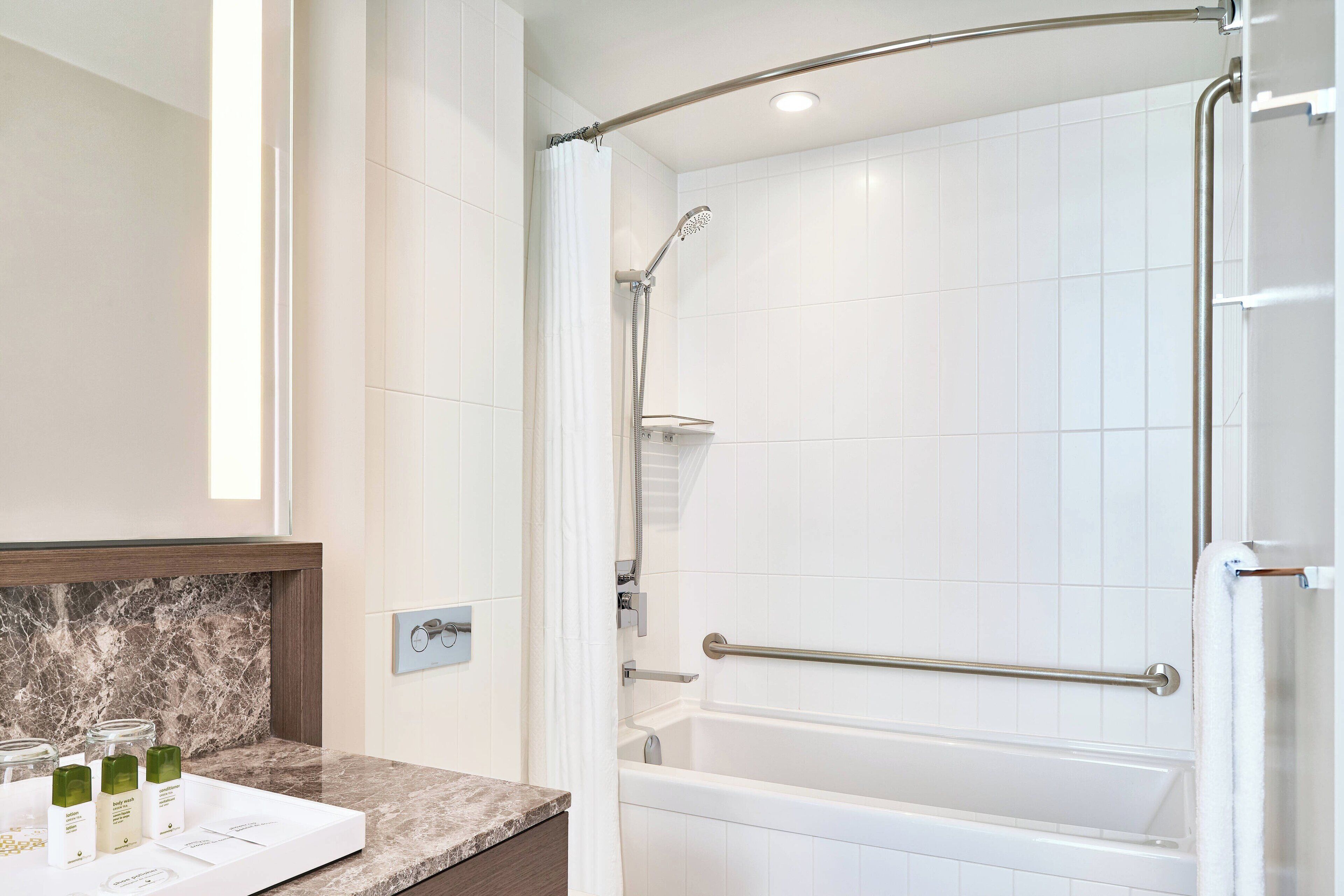 room, 2 queen beds, non smoking | bathroom | shower, free toiletries, hair dryer, bathrobes