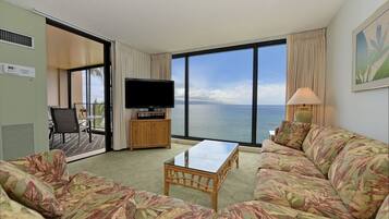 Condo, 1 Bedroom | Living room | Flat-screen TV, DVD player, iPod dock