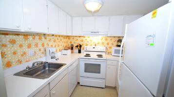 Condo, 1 Bedroom | Private kitchen | Fridge, microwave, dishwasher, coffee/tea maker