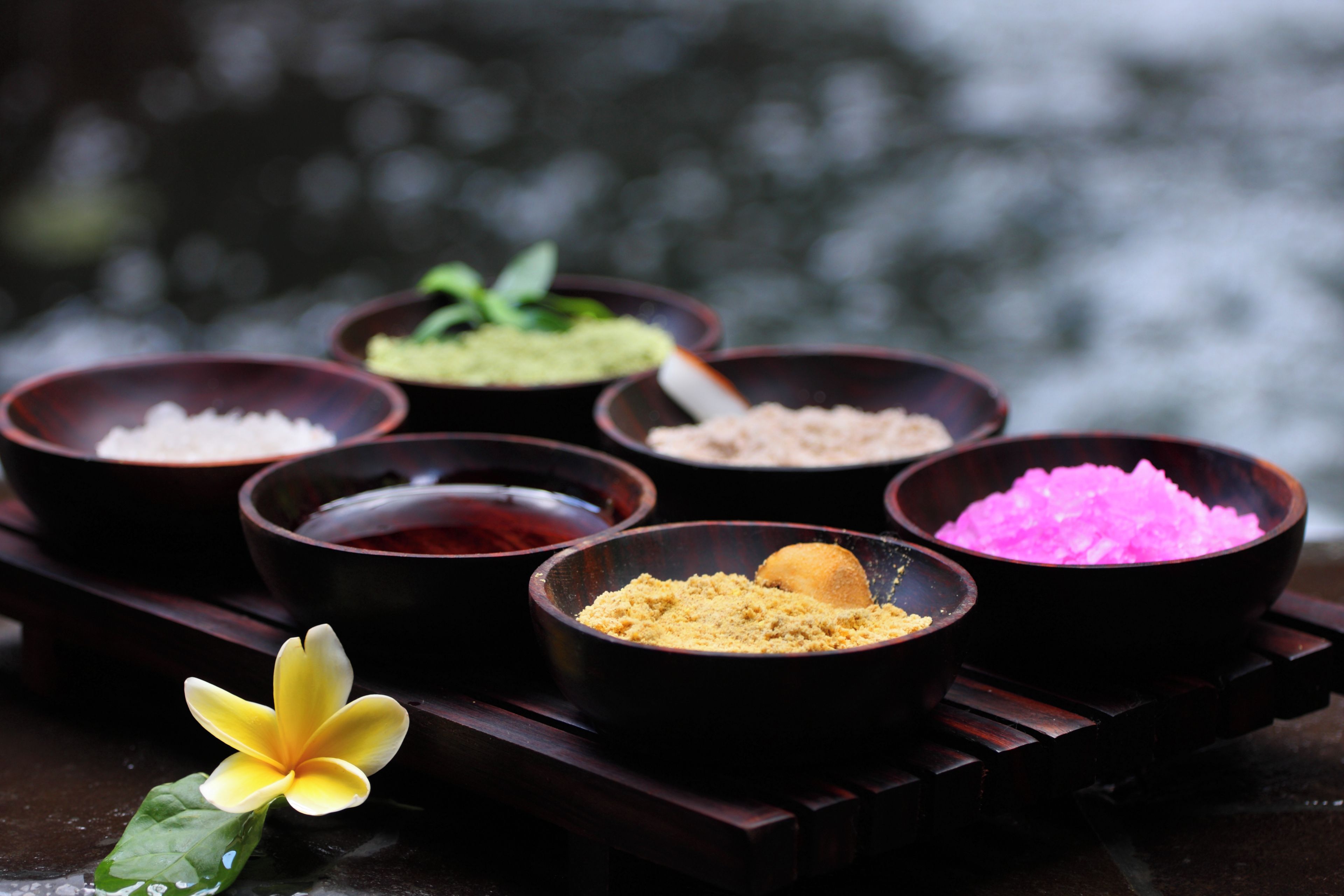 A series of bowls with different contents on a tray.