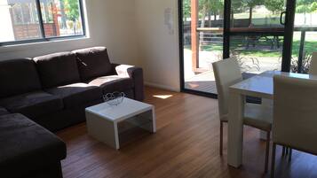 Park View Cabin | Living area | Flat-screen TV, table tennis