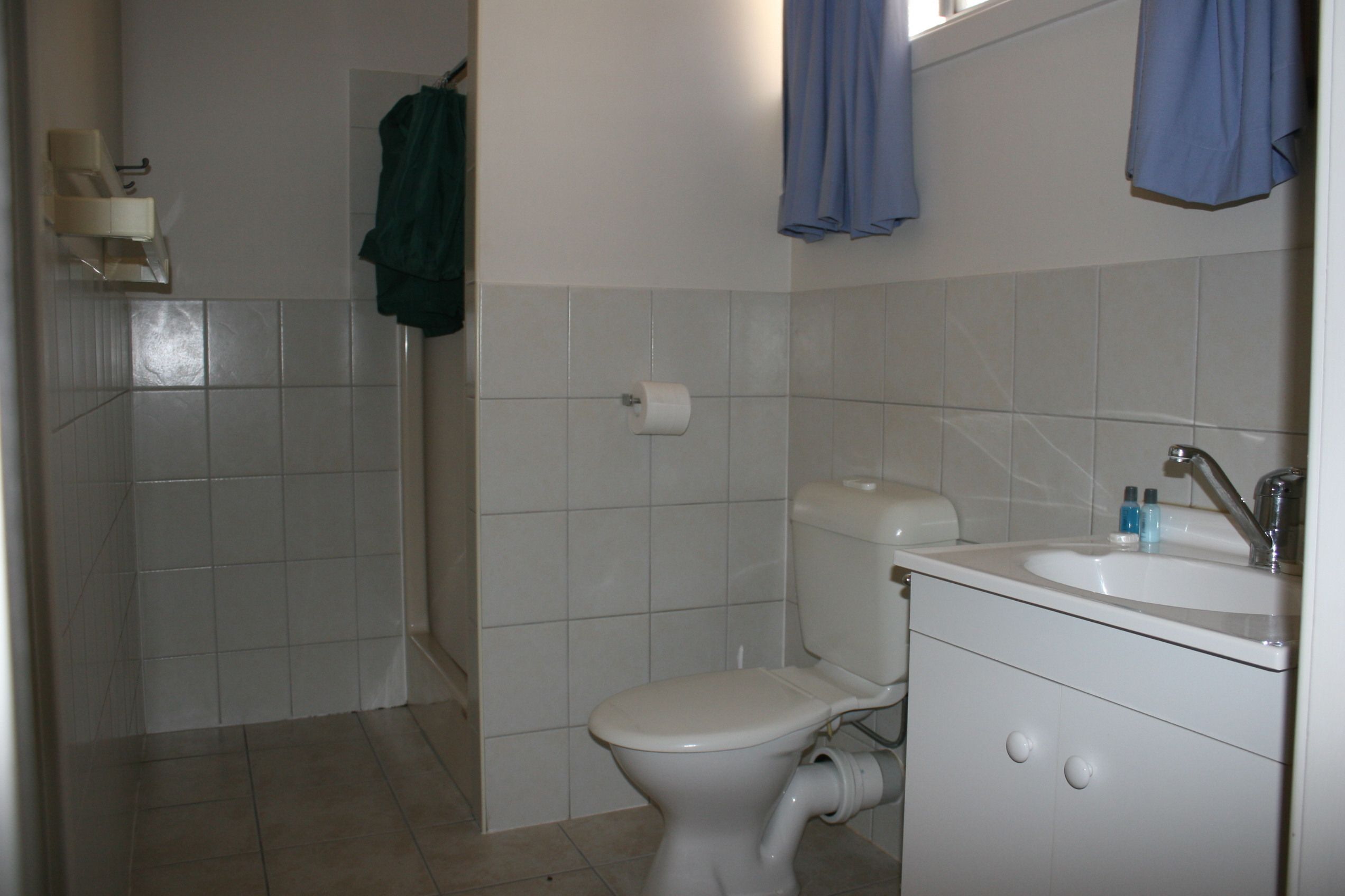 2 bedroom unit (1 queen and 1 triple bunk beds) | bathroom | shower, free toiletries, hair dryer, towels