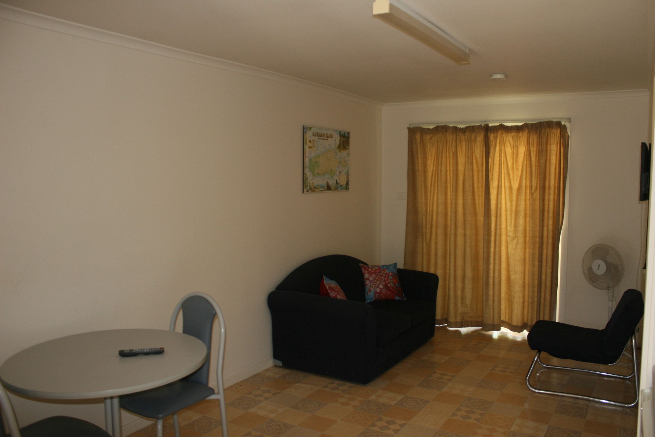 1 bedroom unit | living area | flat-screen tv
