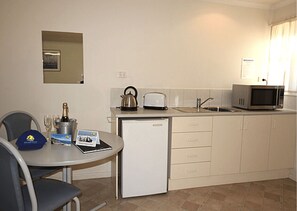 Studio Unit Plus | Private kitchen | Microwave, coffee/tea maker, electric kettle