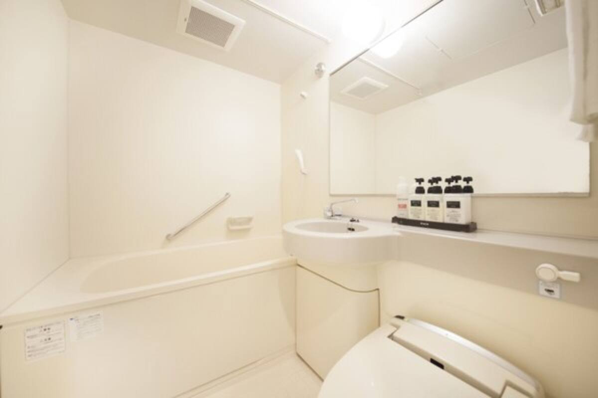 shower, slippers, electronic bidet, towels