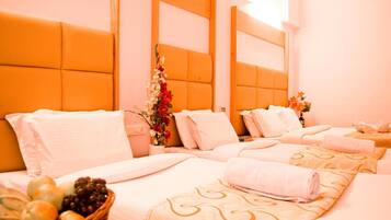 Standard Quadruple Room | 1 bedroom, Egyptian cotton sheets, premium bedding, in-room safe