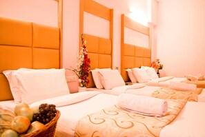 Standard Quadruple Room | 1 bedroom, Egyptian cotton sheets, premium bedding, in-room safe