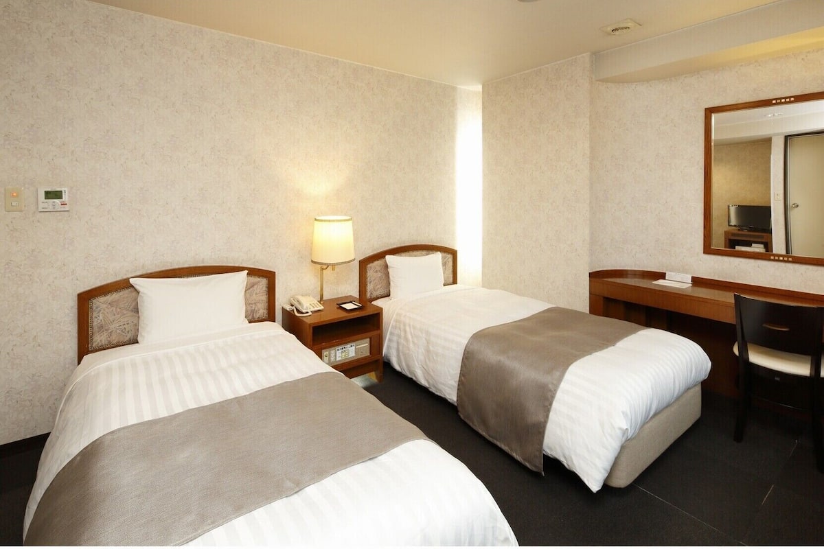 Desk, free WiFi, bed sheets