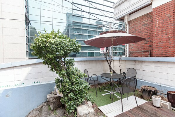 Panoramic Triple Room, 1 Bedroom, Shared Bathroom, Garden View [Must notify check-in time to Hotel] | Teres/patio