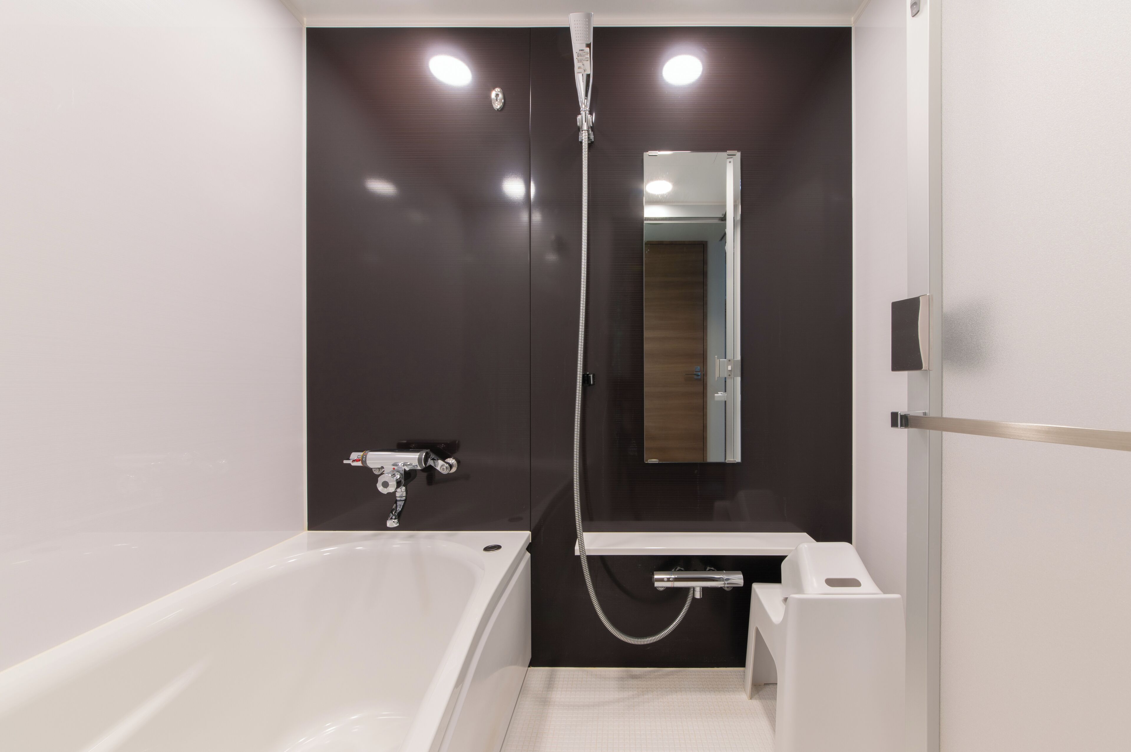 separate bathtub and shower, free toiletries, hair dryer, slippers