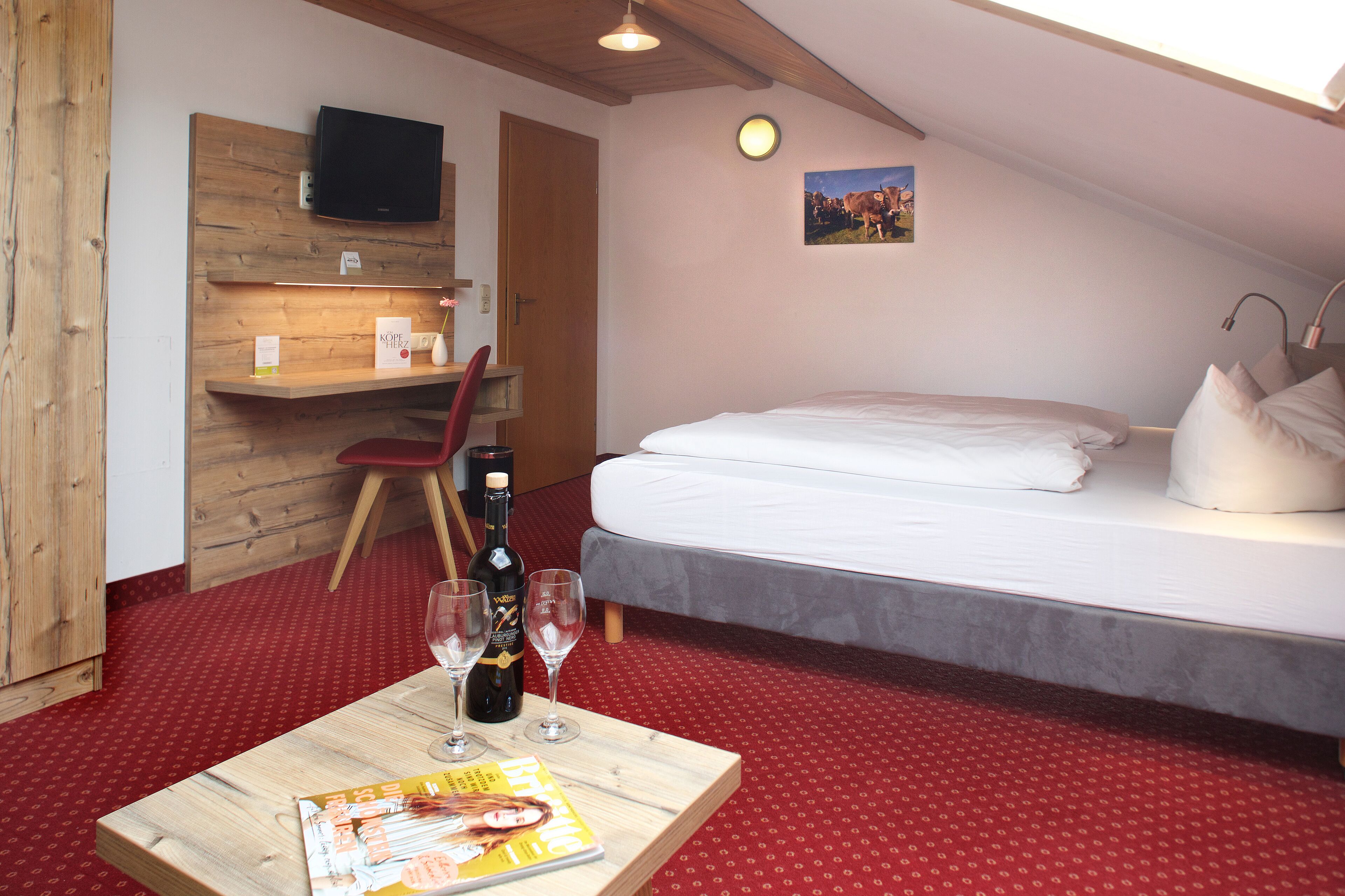 family room | in-room safe, individually decorated, individually furnished, desk