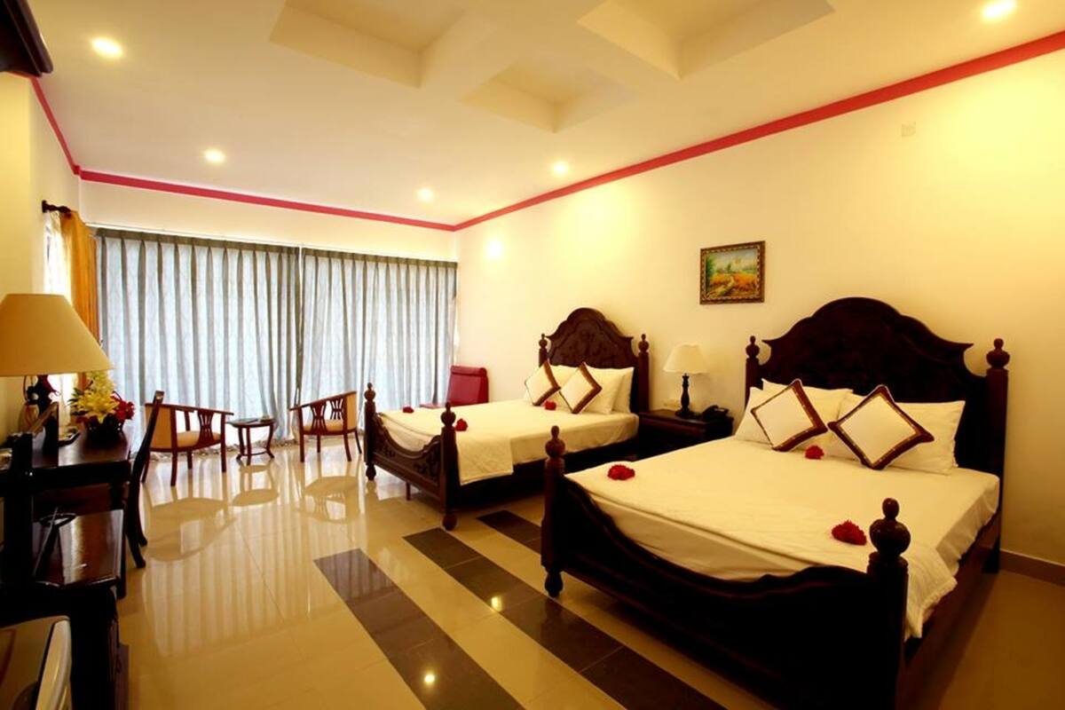 Quadruple Bungalow, Beachfront | Minibar, in-room safe, desk, blackout curtains