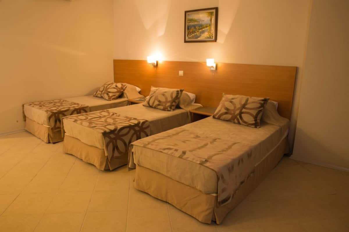 Standard Triple Room | In-room safe, desk, free cribs/infant beds, rollaway beds