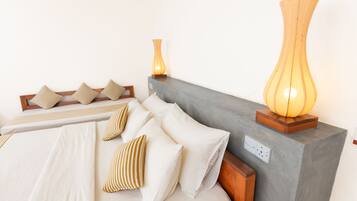 Standard Triple Room, Mountain View | Minibar, in-room safe, individually furnished, desk