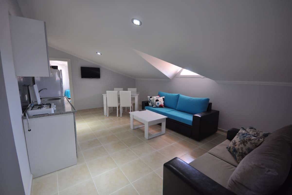 Apartment, 1 Bedroom | Desk, iron/ironing board, free WiFi