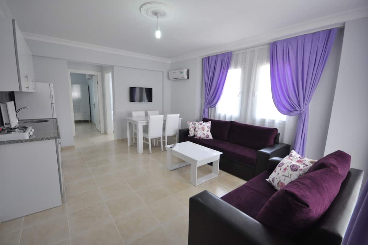 Apartment, 2 Bedrooms | Living area | LED TV