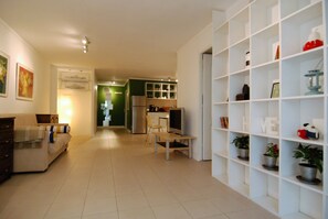 Apartment, 1 Bedroom | Living room | Flat-screen TV