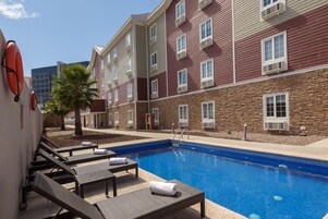 Outdoor pool, open 9:00 AM to 8:00 PM, pool umbrellas, sun loungers