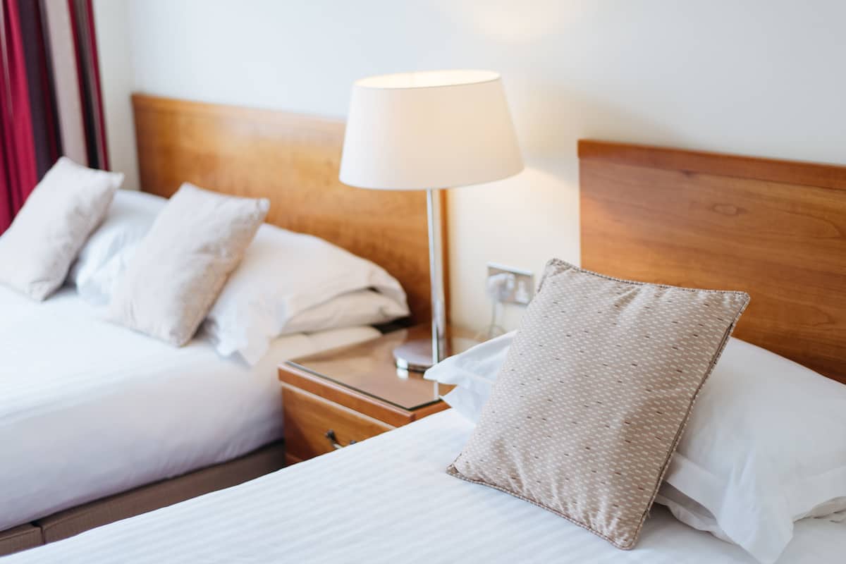 classic twin room | 1 bedroom, individually decorated, desk, iron/ironing board