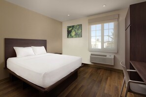 Desk, blackout drapes, bed sheets