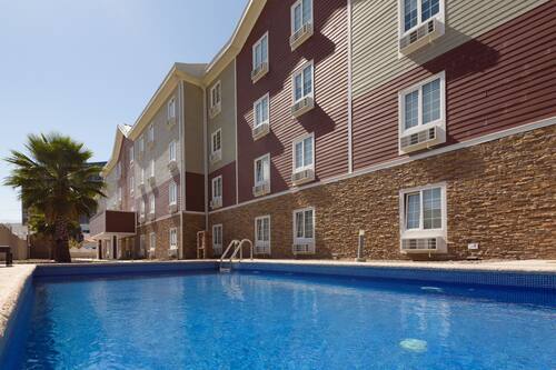 Outdoor pool, open 9 AM to 8:00 PM, pool umbrellas, sun loungers