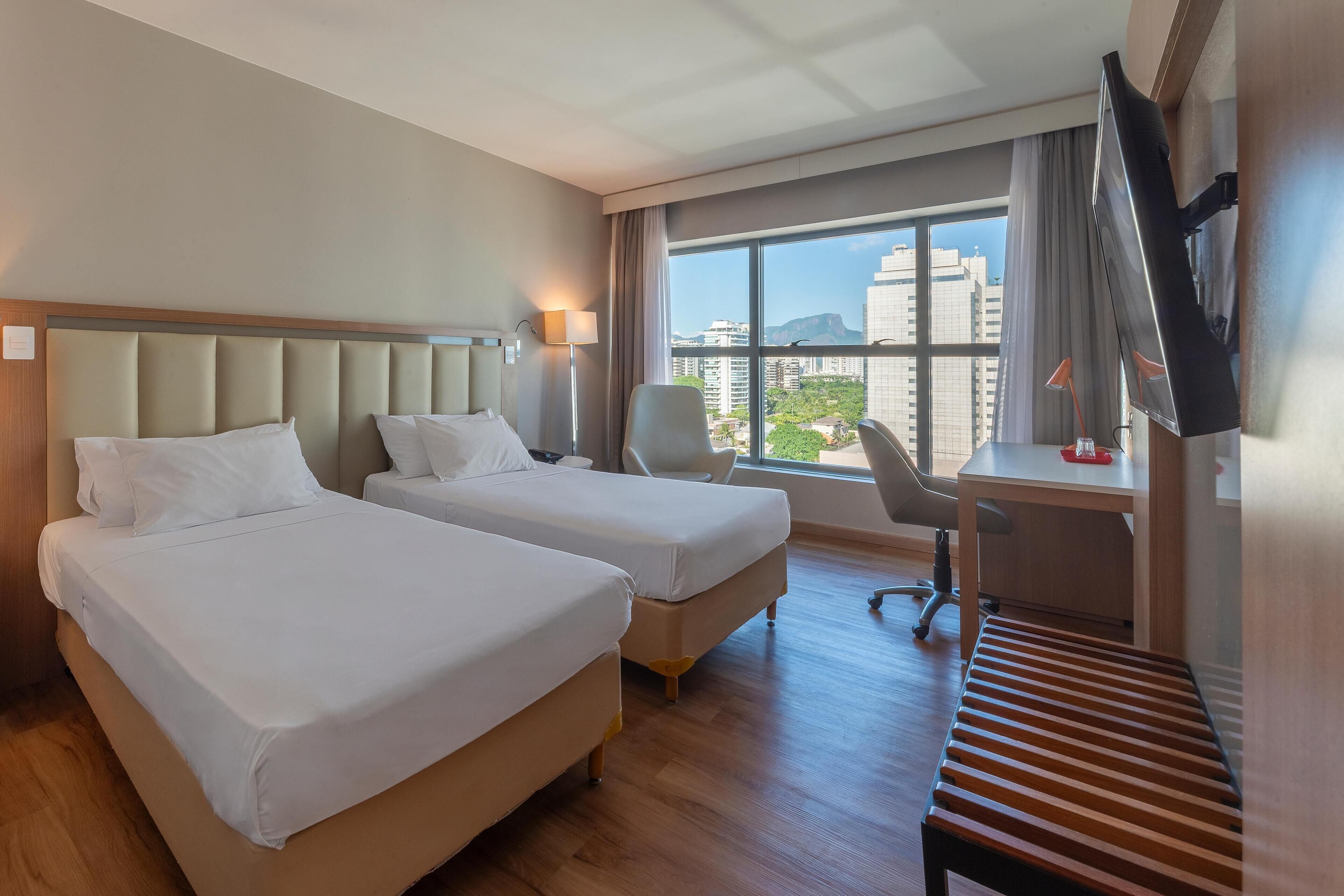 Hypo-allergenic bedding, minibar, in-room safe, desk