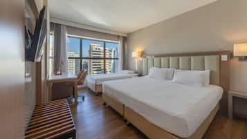 Triple Style | Hypo-allergenic bedding, minibar, in-room safe, desk