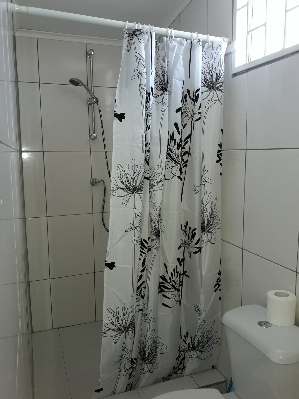 Estudio tradicional | Baño | Regadera y toallas 