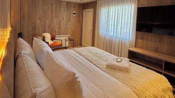 1 habitación, minibar, escritorio y espacio para trabajar con laptop