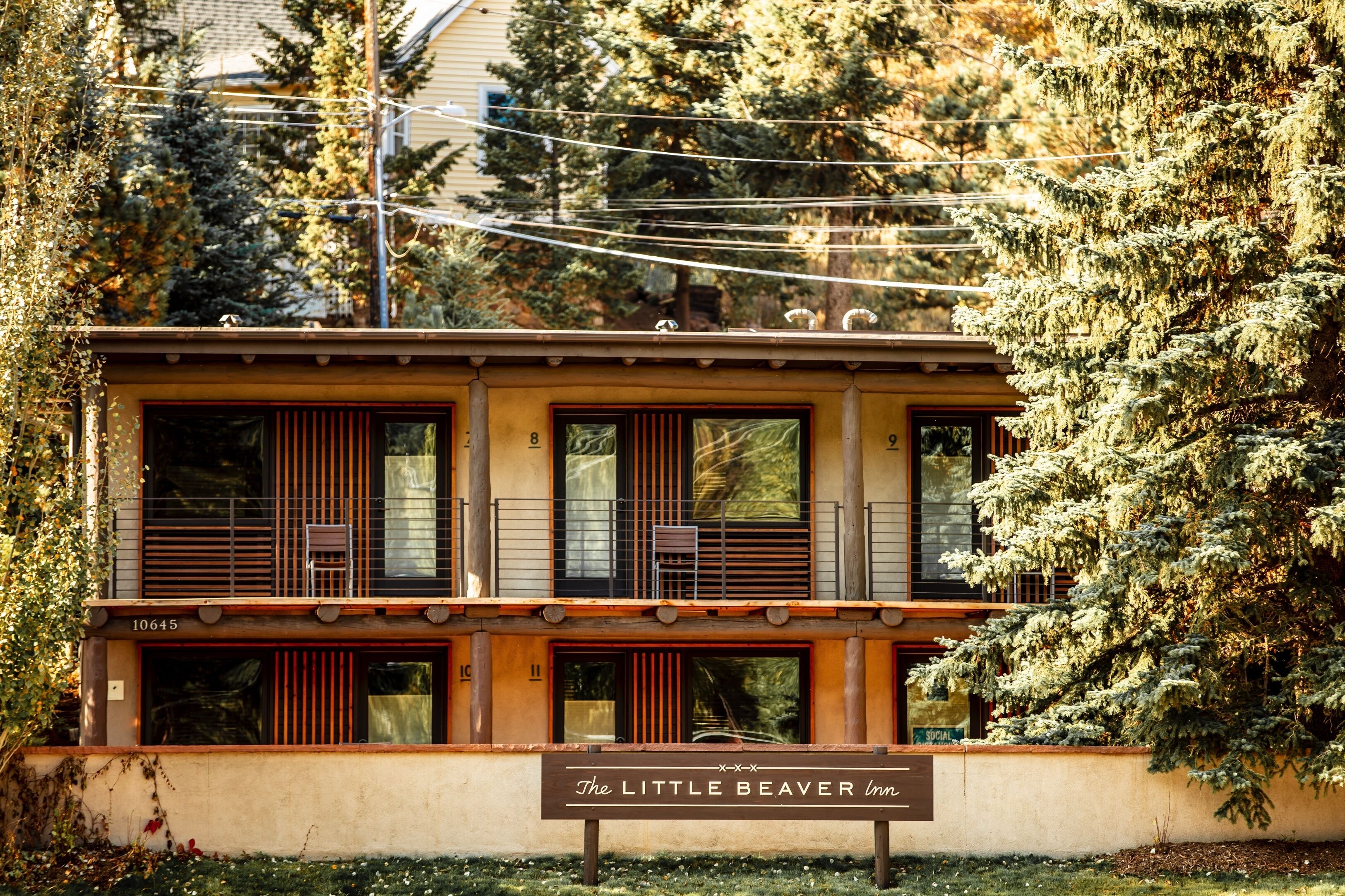 A two-story building with a sign reading "The Little Beaver Inn."