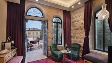 Junior Suite, City View | Living area | Flat-screen TV, pay movies