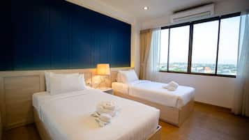 Nakara Boutique Twin Bed | Blackout curtains, rollaway beds, free WiFi, bed sheets