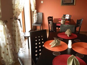 Breakfast and dinner served, local and international cuisine