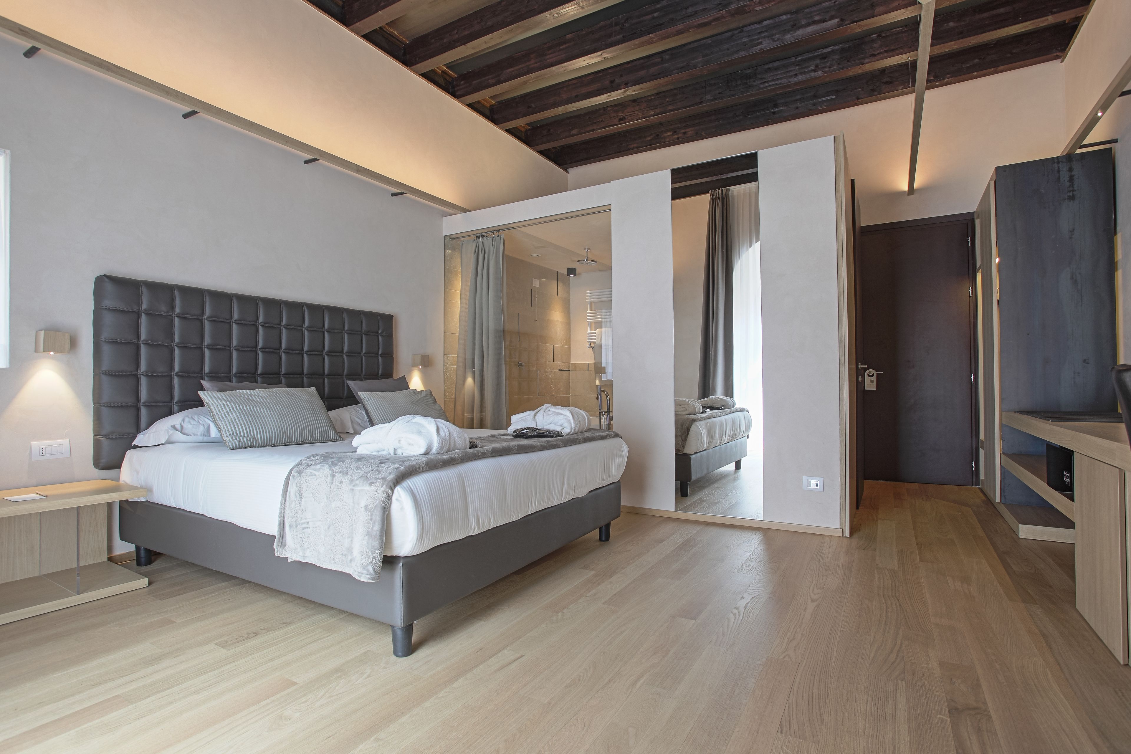 junior suite | in-room safe, desk, blackout curtains, soundproofing