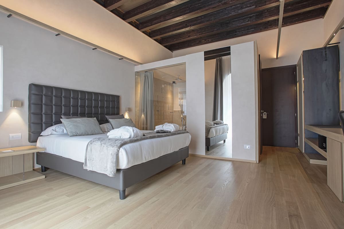 junior suite | in-room safe, desk, blackout curtains, soundproofing