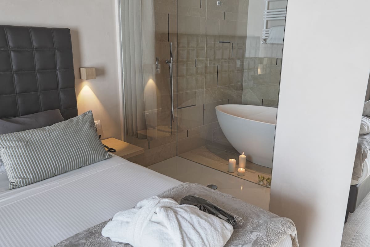 junior suite | in-room safe, desk, blackout curtains, soundproofing