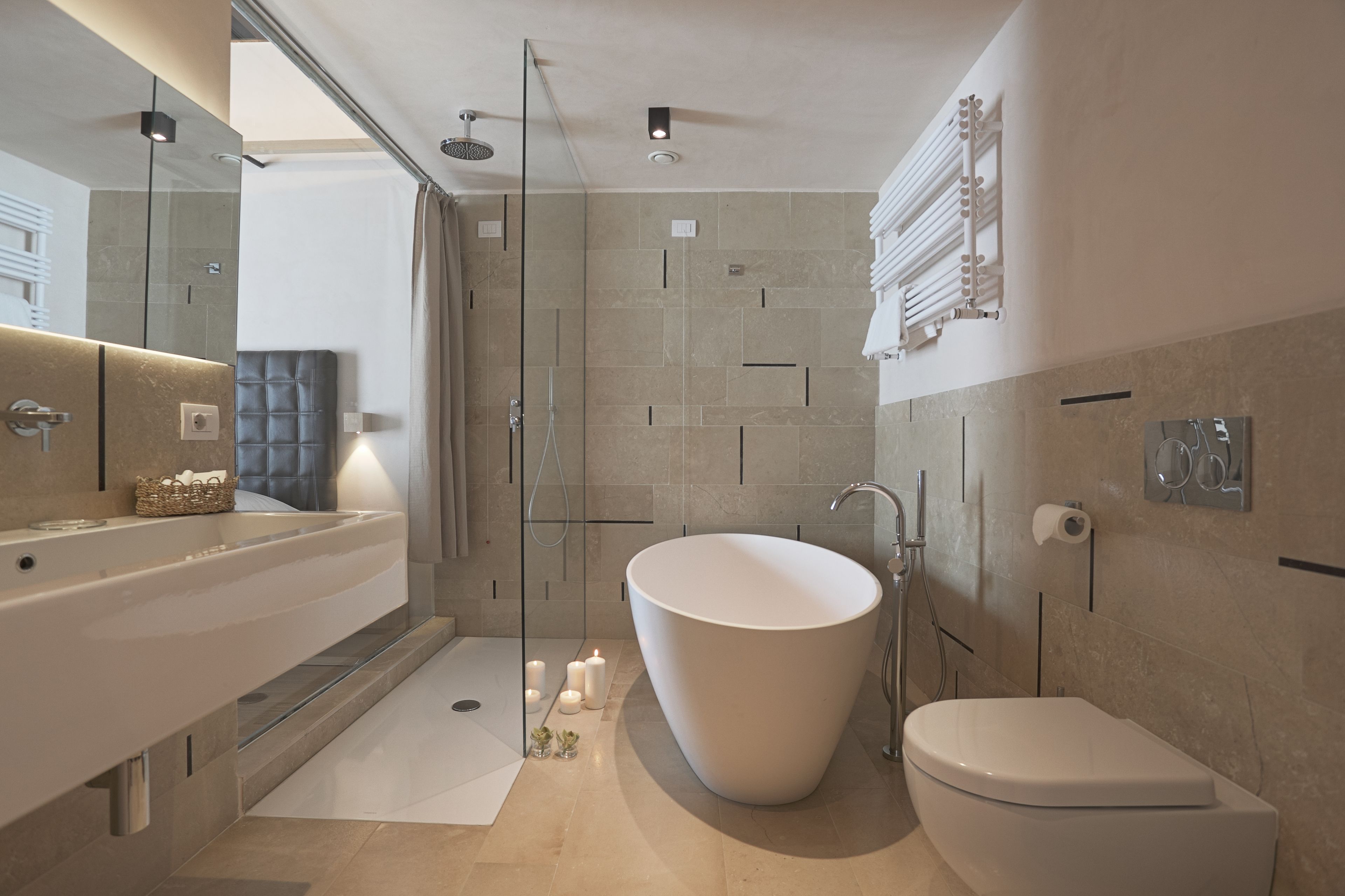 junior suite | bathroom | shower, free toiletries, hair dryer, slippers