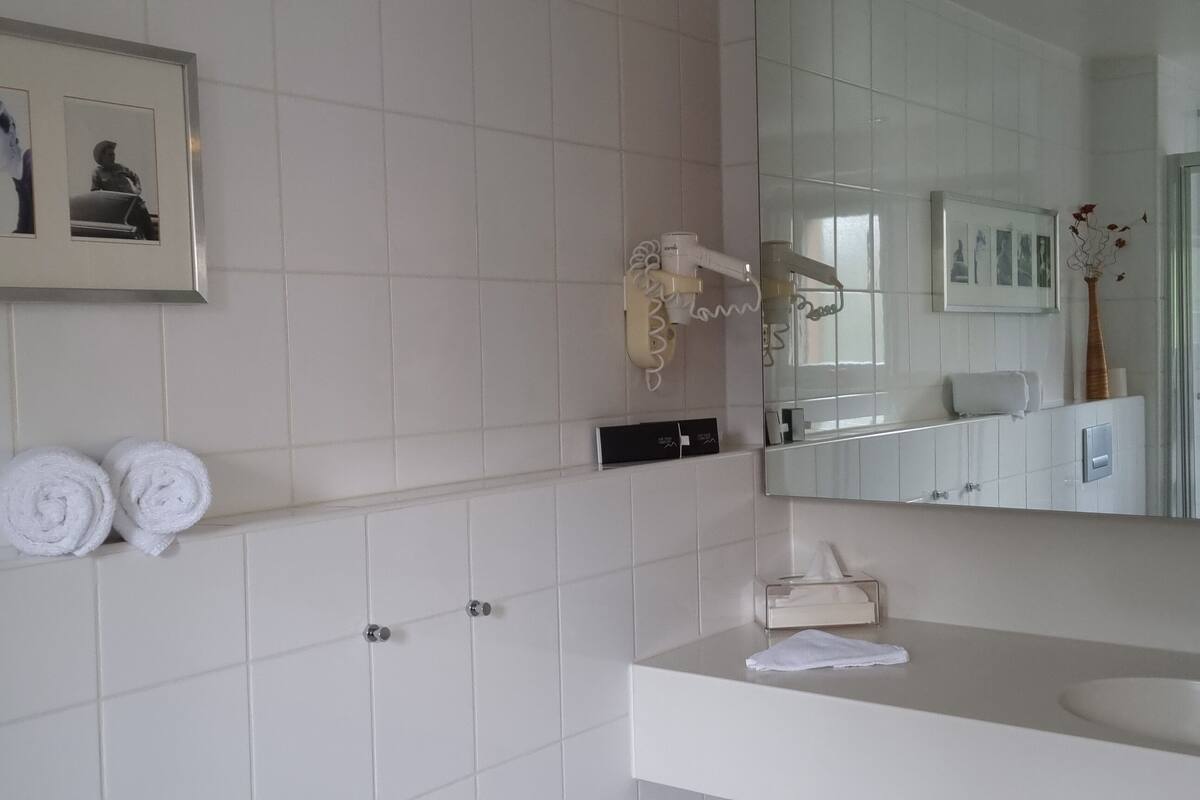 suite | bathroom | free toiletries, slippers, towels