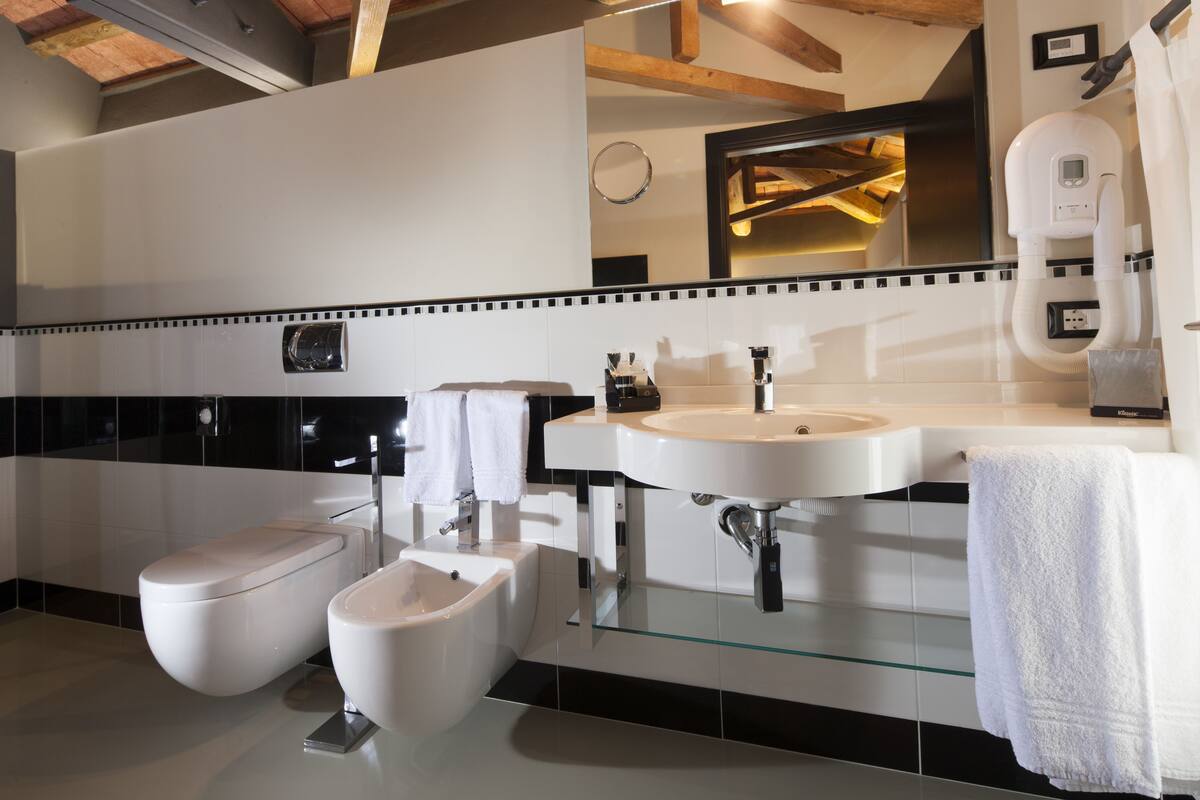 shower, free toiletries, hair dryer, bathrobes