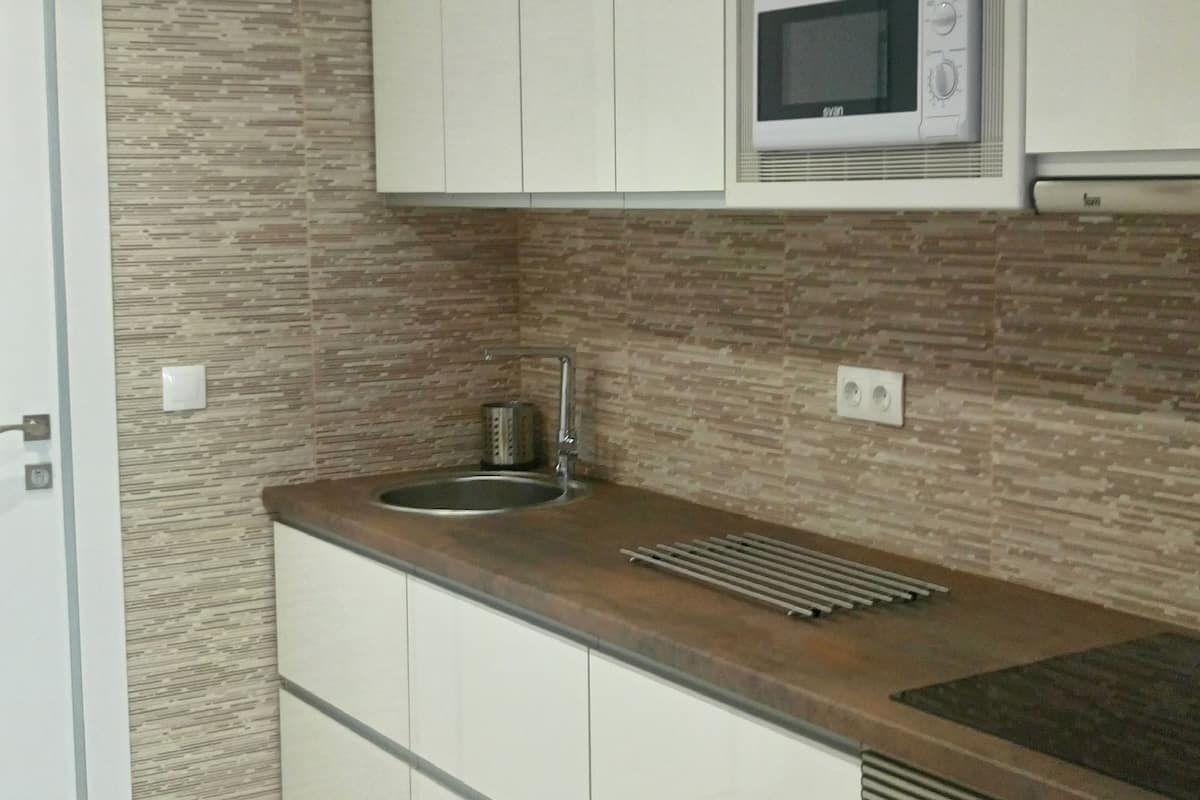 studio, pool view | private kitchen | full-sized fridge, microwave, oven, stovetop