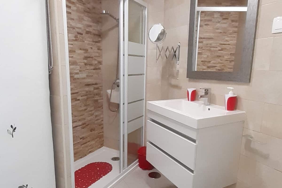 studio, pool view | bathroom | shower, hair dryer, towels