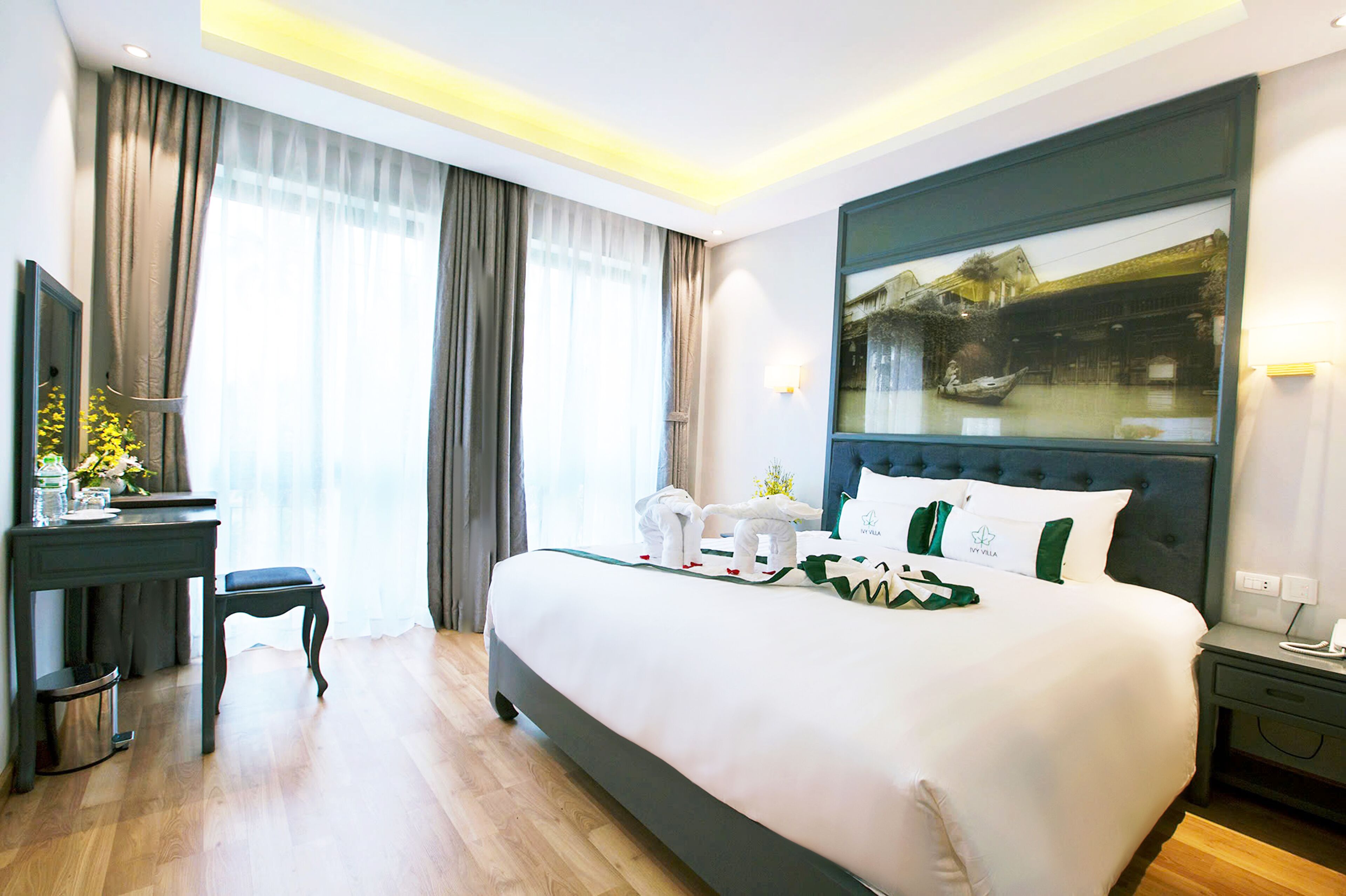 deluxe double room | minibar, desk, blackout curtains, soundproofing