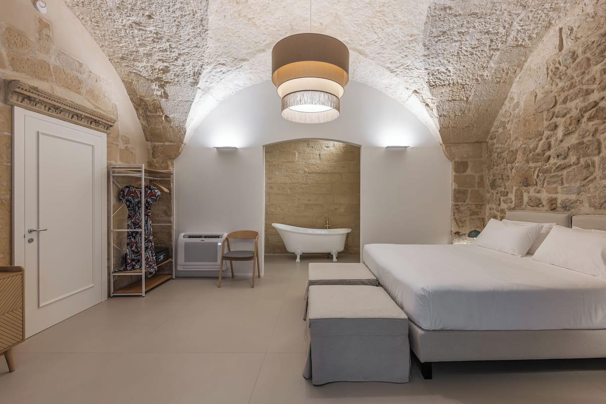 Suite | 1 slaapkamer, luxe beddengoed, donsdekens, een minibar